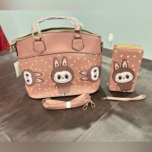 The Monsters crossbody bag with matching double sided double zipper wallet.